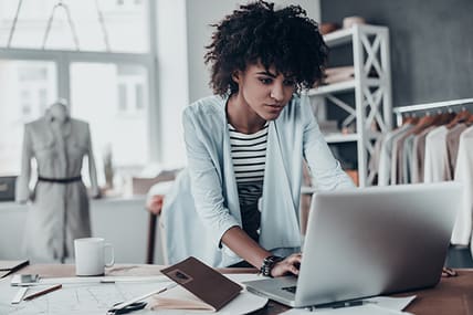 business woman checking her laptop computer