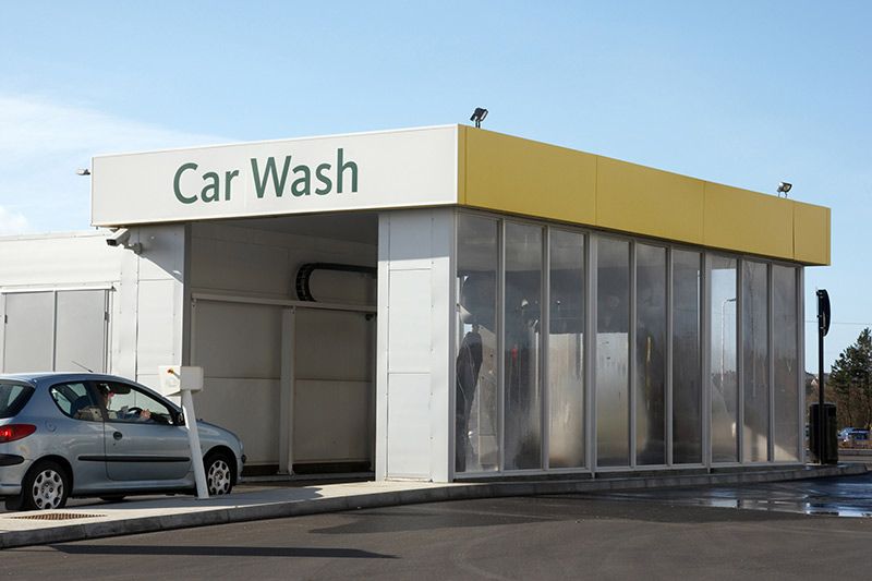 car about to enter a car wash