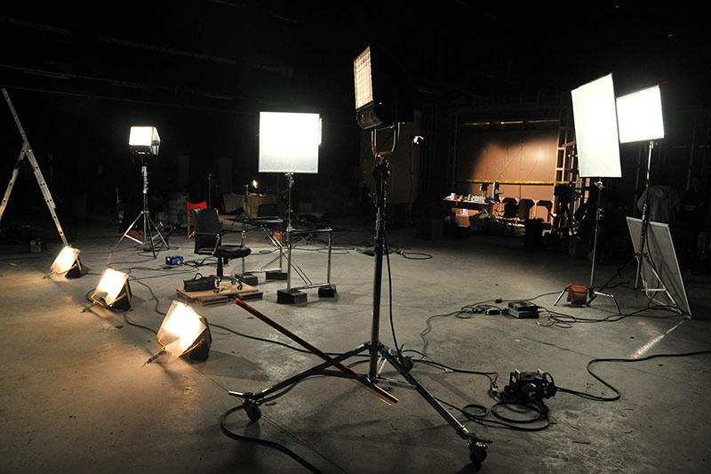 video production set with lots of studio lights