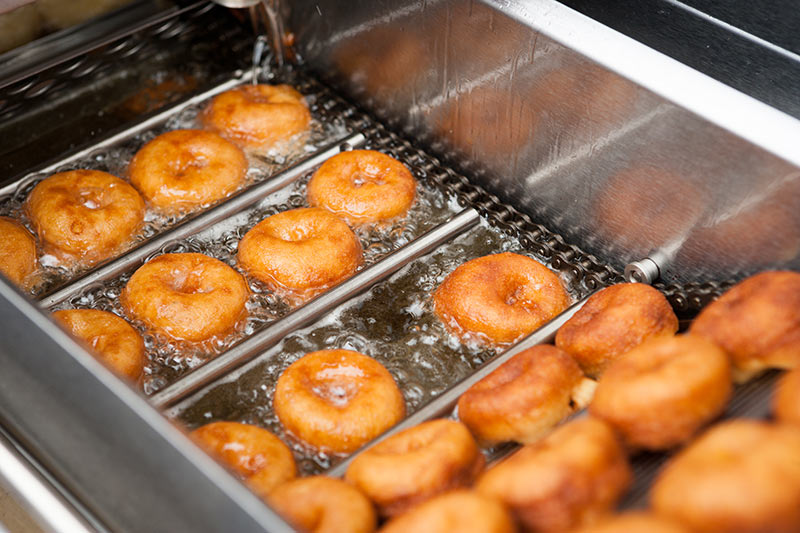 donuts in the fryer