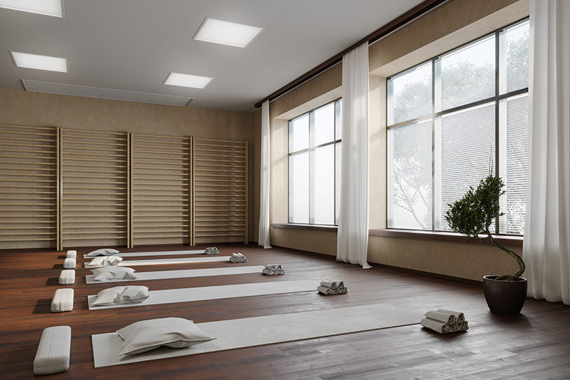 beautiful yoga studio with open windows and natural light
