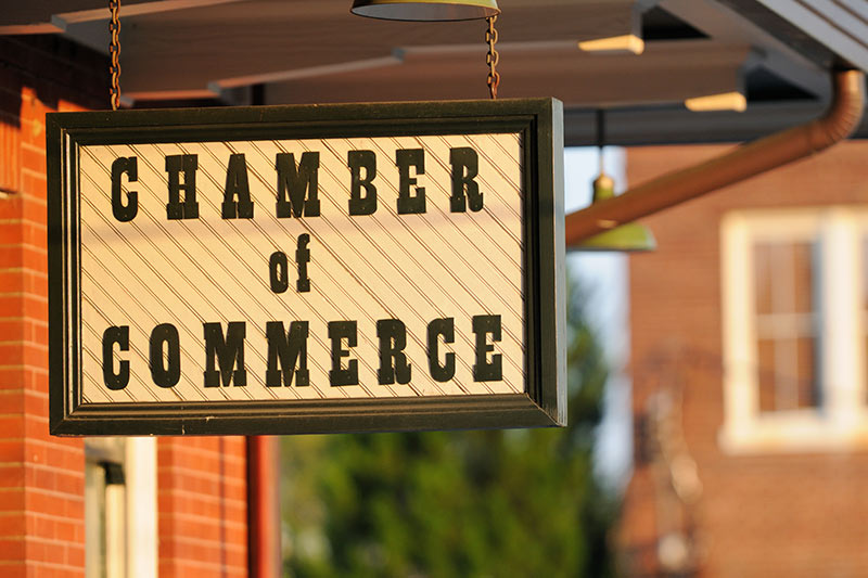local chamber of commerce sign in a small town