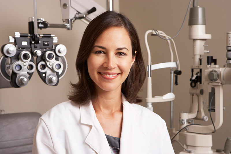 female optometrist smiling