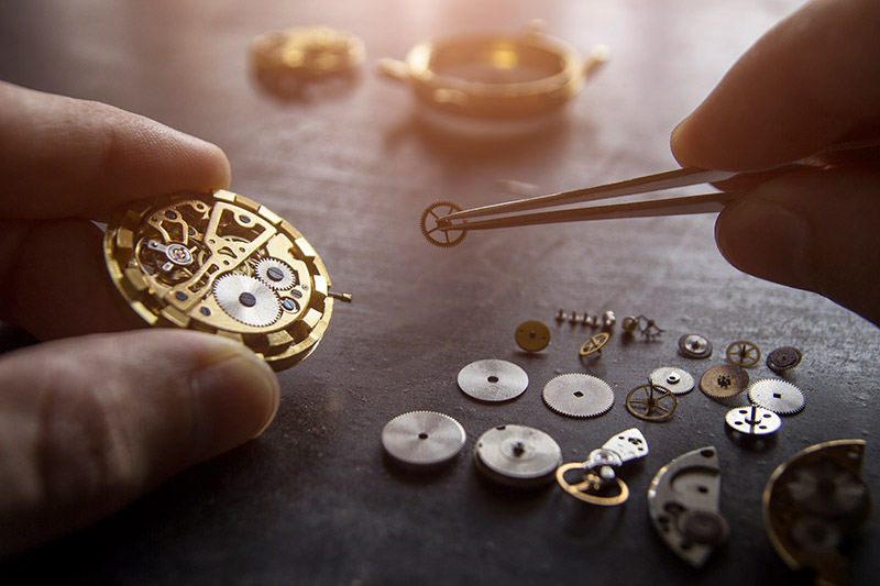 watch being meticulously repaired, watch repair business loans