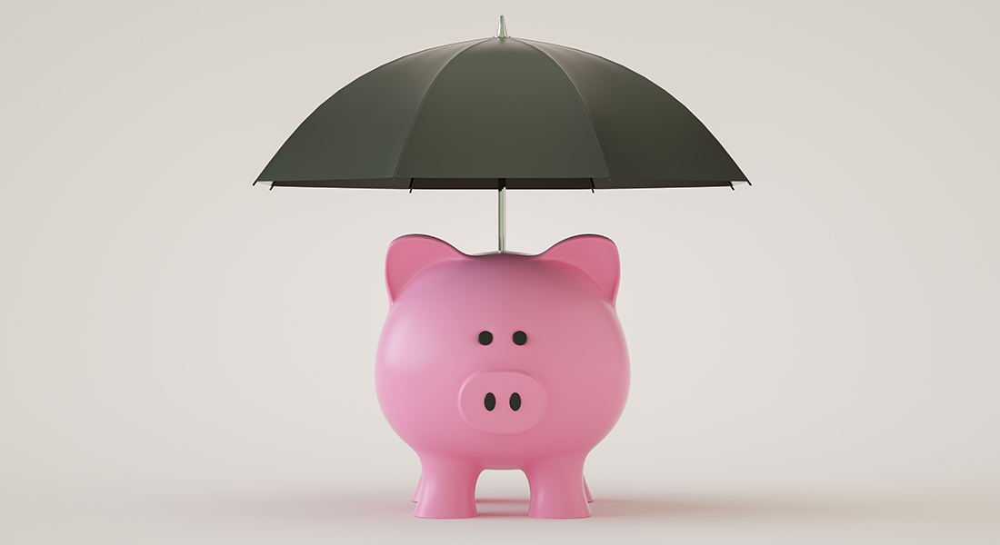 pink piggy bank with umbrella, understanding the debt to capital ratio