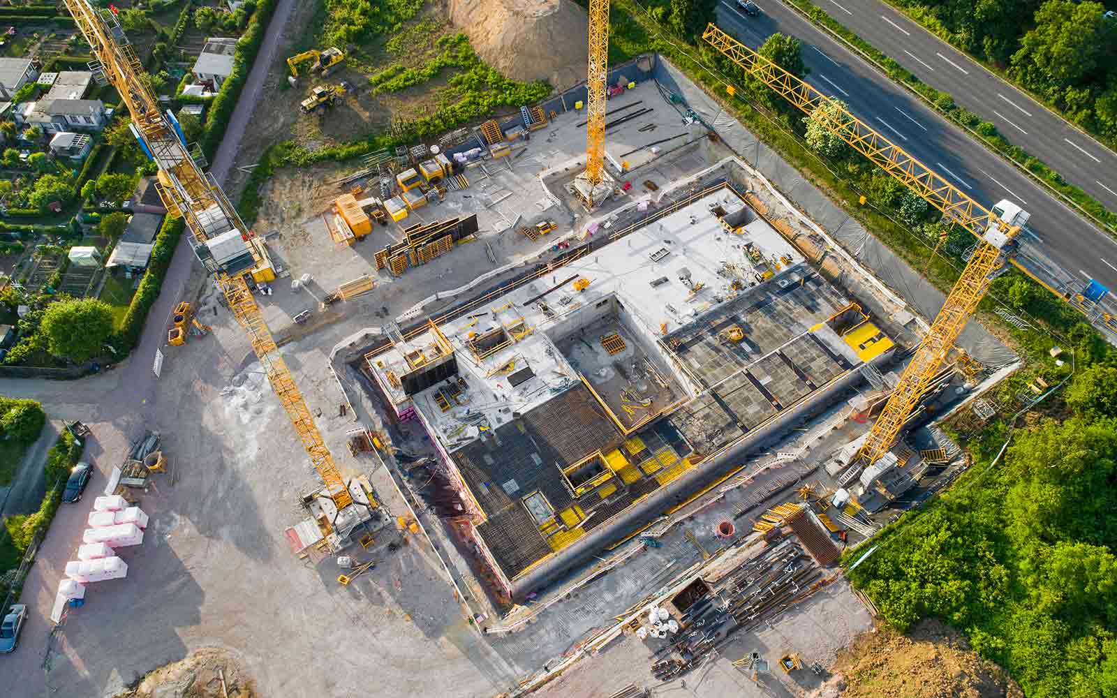 aerial image of construction vehicles, construction equipment vendor financing
